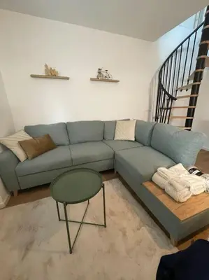 Coin salon dans l'établissement Appartement chaleureux au pied des pistes