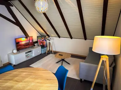 Télévision ou salle de divertissement dans l'établissement Spacieux Appartement 3 chambres Cosy