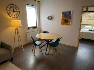 Coin salon dans l'établissement Spacieux Appartement 3 chambres Cosy