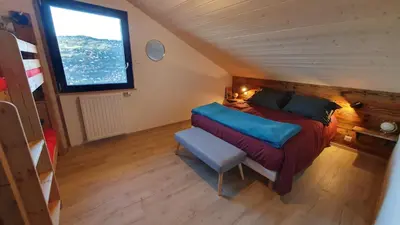 Un ou plusieurs lits dans un hébergement de l'établissement CHALET LE 17 4 étoiles