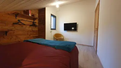 Un ou plusieurs lits dans un hébergement de l'établissement CHALET LE 17 4 étoiles
