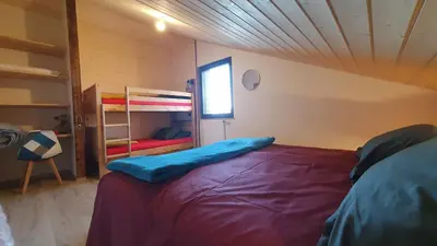 Un ou plusieurs lits dans un hébergement de l'établissement CHALET LE 17 4 étoiles