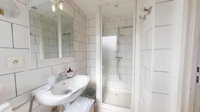 Salle de bains dans l'établissement Les Cigognes d'Alsace