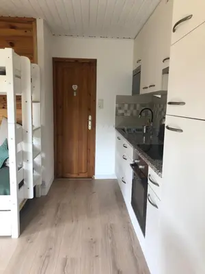 Cuisine ou kitchenette dans l'établissement Chalet à Gérardmer - Vue montagne - Calme & Paisible