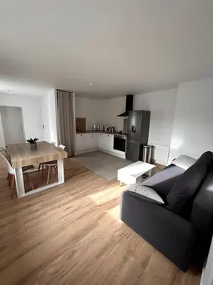 Coin salon dans l'établissement Appartement 4/6 personnes - Cornimont