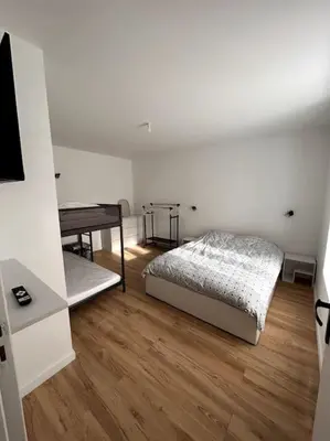 Un ou plusieurs lits dans un hébergement de l'établissement Appartement 4/6 personnes - Cornimont