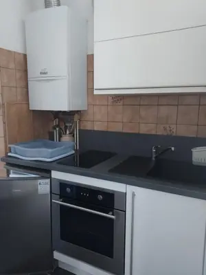 Cuisine ou kitchenette dans l'établissement Studio côté jardin