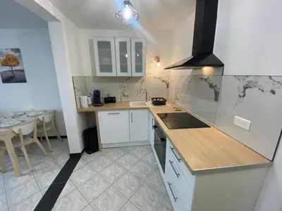 Cuisine ou kitchenette dans l'établissement Le 11 de Colmar