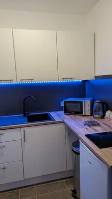 Cuisine ou kitchenette dans l'établissement Escapade Mulhousienne
