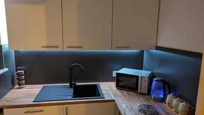 Cuisine ou kitchenette dans l'établissement Escapade Mulhousienne