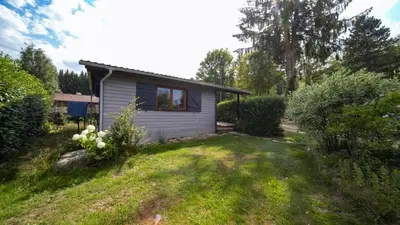 Jardin de l'établissement Le chalet de DOMY