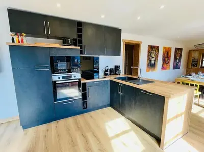 Cuisine ou kitchenette dans l'établissement Appartement La Galerie de Mémé