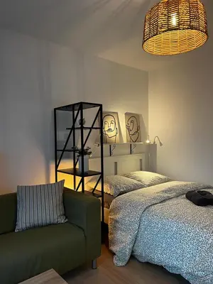 Un ou plusieurs lits dans un hébergement de l'établissement Proche Centre Mulhouse - Studio cosy