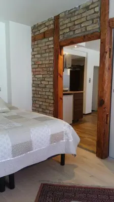 Un ou plusieurs lits dans un hébergement de l'établissement Guesthouse Le Vauban