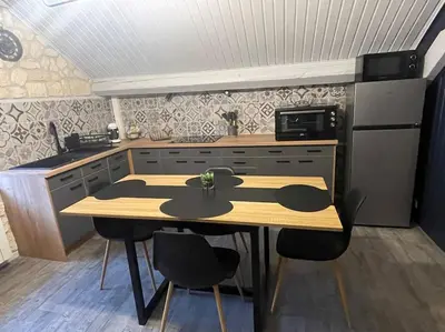 Cuisine ou kitchenette dans l'établissement L appartement chez J&C