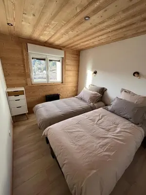 Un ou plusieurs lits dans un hébergement de l'établissement Le Balcon de Bramont