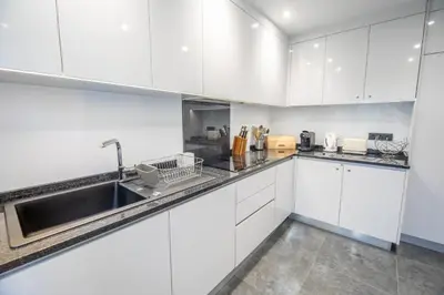 Cuisine ou kitchenette dans l'établissement Appartement 3ch rénové en 2023 avec sauna