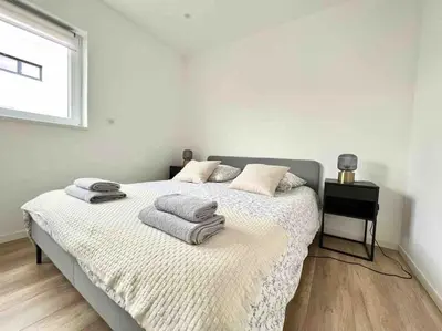 Un ou plusieurs lits dans un hébergement de l'établissement Bel appartement en plain-pied 5 min de Colmar