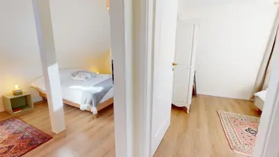 Un ou plusieurs lits dans un hébergement de l'établissement Maison tilleul de la vallée noble