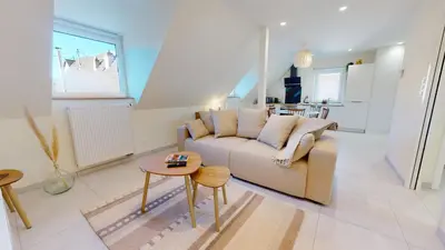 Coin salon dans l'établissement Maison tilleul de la vallée noble