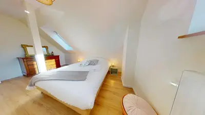 Un ou plusieurs lits dans un hébergement de l'établissement Maison tilleul de la vallée noble