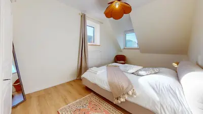 Un ou plusieurs lits dans un hébergement de l'établissement Maison tilleul de la vallée noble