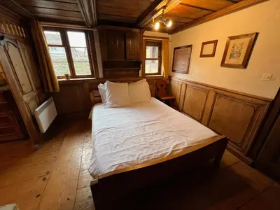Un ou plusieurs lits dans un hébergement de l'établissement Gîte de l'Ortenbourg - mobilier d antiquaire