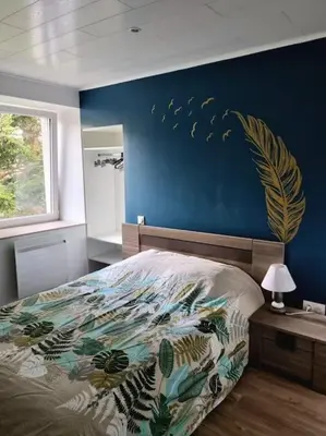 Un ou plusieurs lits dans un hébergement de l'établissement Appartement chaleureux 80m2