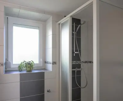 Salle de bains dans l'établissement Chez Lydie