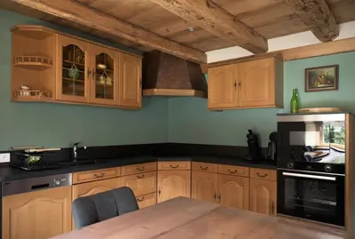 Cuisine ou kitchenette dans l'établissement Chez Lydie