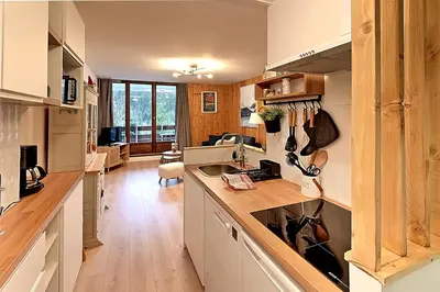 Cuisine ou kitchenette dans l'établissement Moho des Oursons - Pistes de ski à 450m