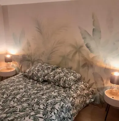 Un ou plusieurs lits dans un hébergement de l'établissement Apartment calme
