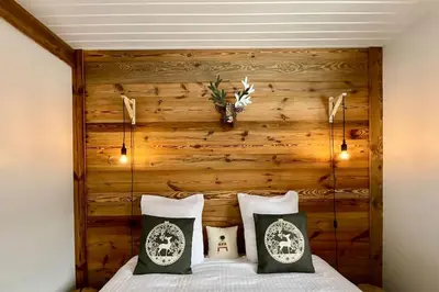 Un ou plusieurs lits dans un hébergement de l'établissement Chalet du Pré - Sauna, terrasse et grand jardin