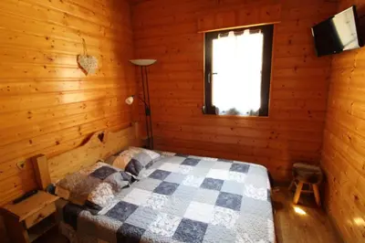 Un ou plusieurs lits dans un hébergement de l'établissement Maison de style chalet individuelle Le Rouge Feigne à La Bresse