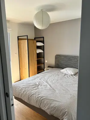Un ou plusieurs lits dans un hébergement de l'établissement Appartement Neuf VUE LAC 6/8pers