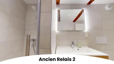 Salle de bains dans l'établissement Résidence de l'ancien relais