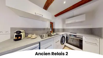 Cuisine ou kitchenette dans l'établissement Résidence de l'ancien relais