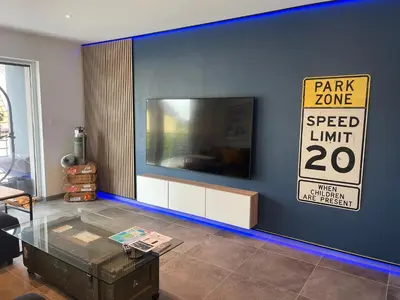 Télévision ou salle de divertissement dans l'établissement Colmar Appartement terrasse 10min centre ville