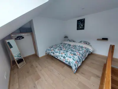 Un ou plusieurs lits dans un hébergement de l'établissement Bel appartement 6pers