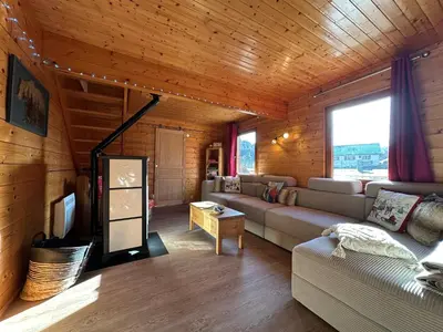 Télévision ou salle de divertissement dans l'établissement Le chalet des Broches - jacuzzi