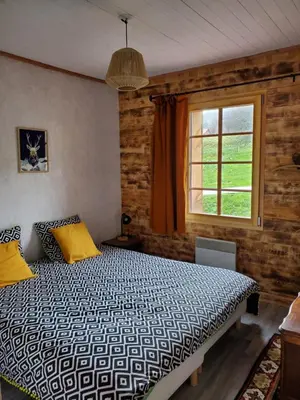 Un ou plusieurs lits dans un hébergement de l'établissement Le chalet Lili