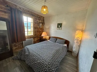 Un ou plusieurs lits dans un hébergement de l'établissement Le chalet Lili