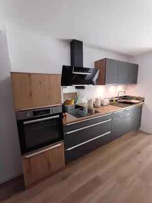 Cuisine ou kitchenette dans l'établissement Agréable 3 pièces au Lac Blanc