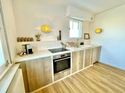 Cuisine ou kitchenette dans l'établissement Maison individuelle 100 m2, jardin et parking privé