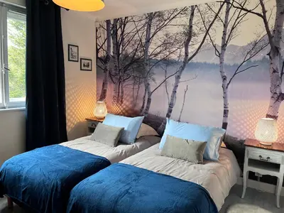 Un ou plusieurs lits dans un hébergement de l'établissement LES FERMES DE PINPIN - LE PAVILLON