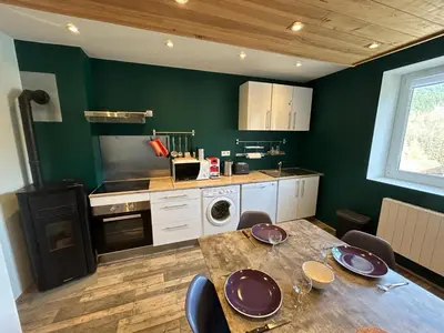 Cuisine ou kitchenette dans l'établissement Le Travexin