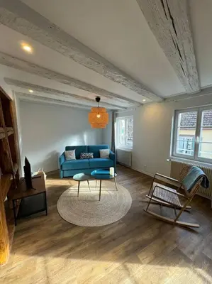 Coin salon dans l'établissement Les pensées d'Anne & Marie duplex 4/6 Personnes