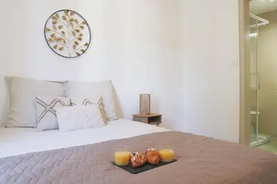 Un ou plusieurs lits dans un hébergement de l'établissement La Chambre Chamane