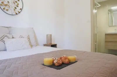 Un ou plusieurs lits dans un hébergement de l'établissement La Chambre Chamane
