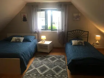 Un ou plusieurs lits dans un hébergement de l'établissement Maison de village près de Colmar de 90 m2